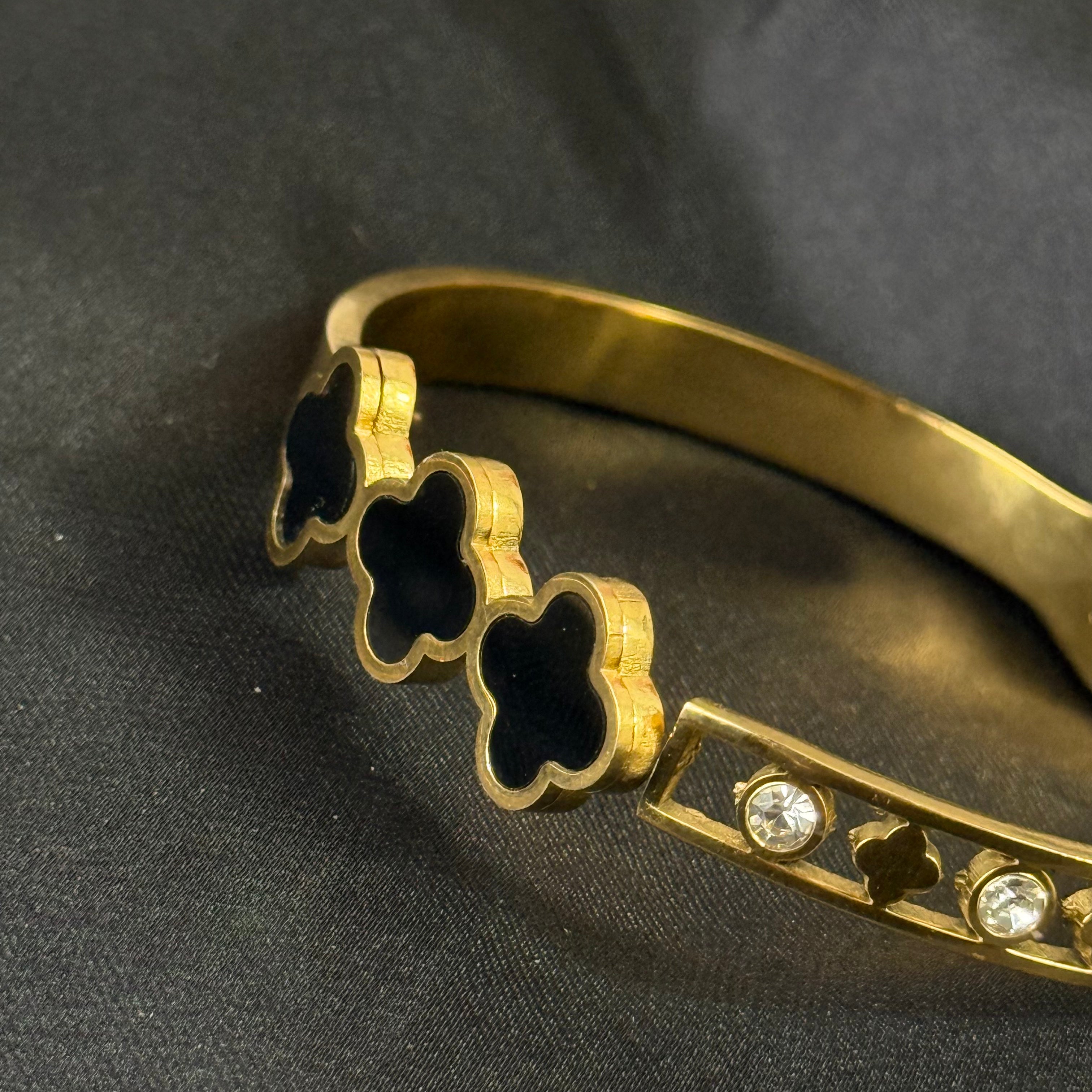 Golden Four-Leaf Clover Bangle Bracelet