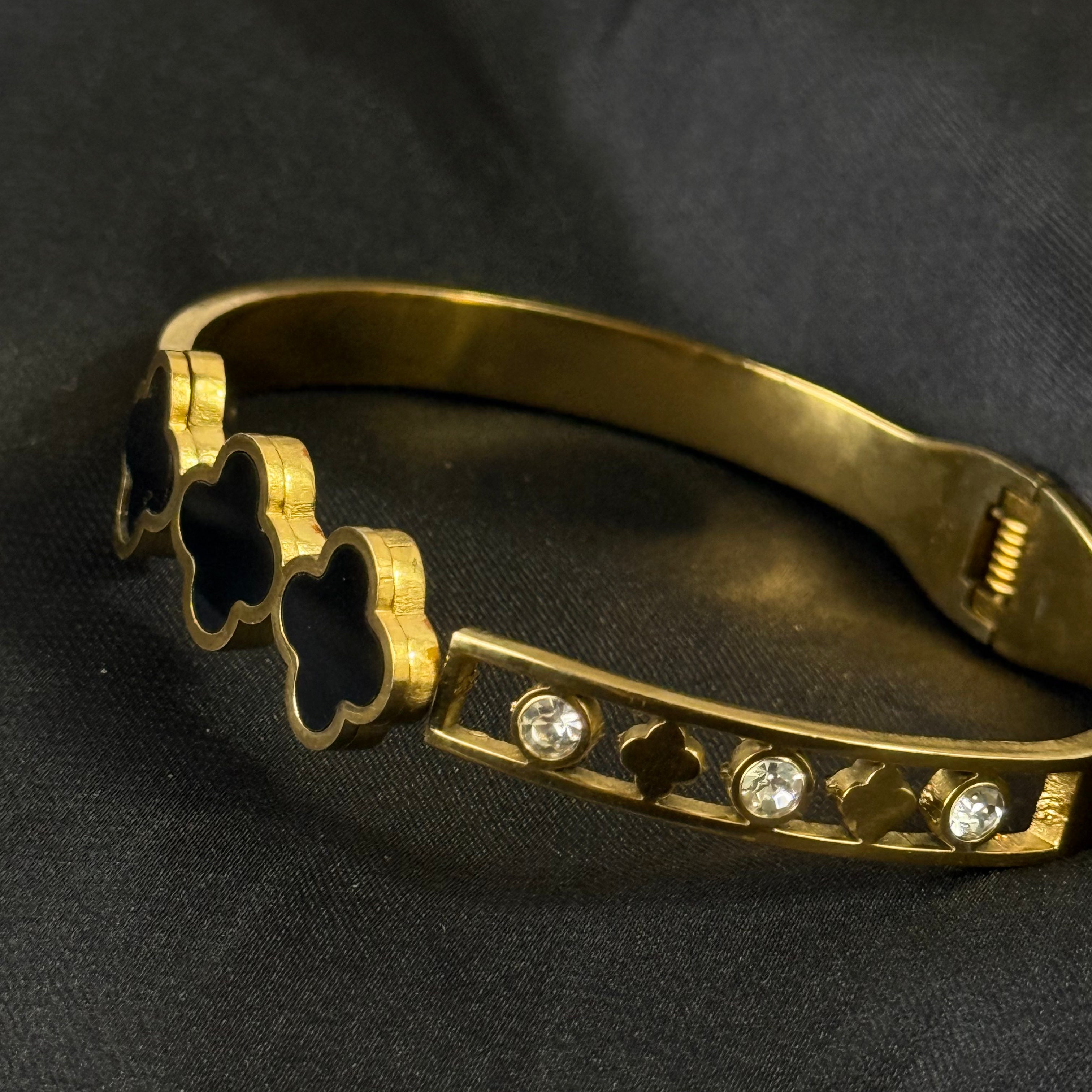 Golden Four-Leaf Clover Bangle Bracelet