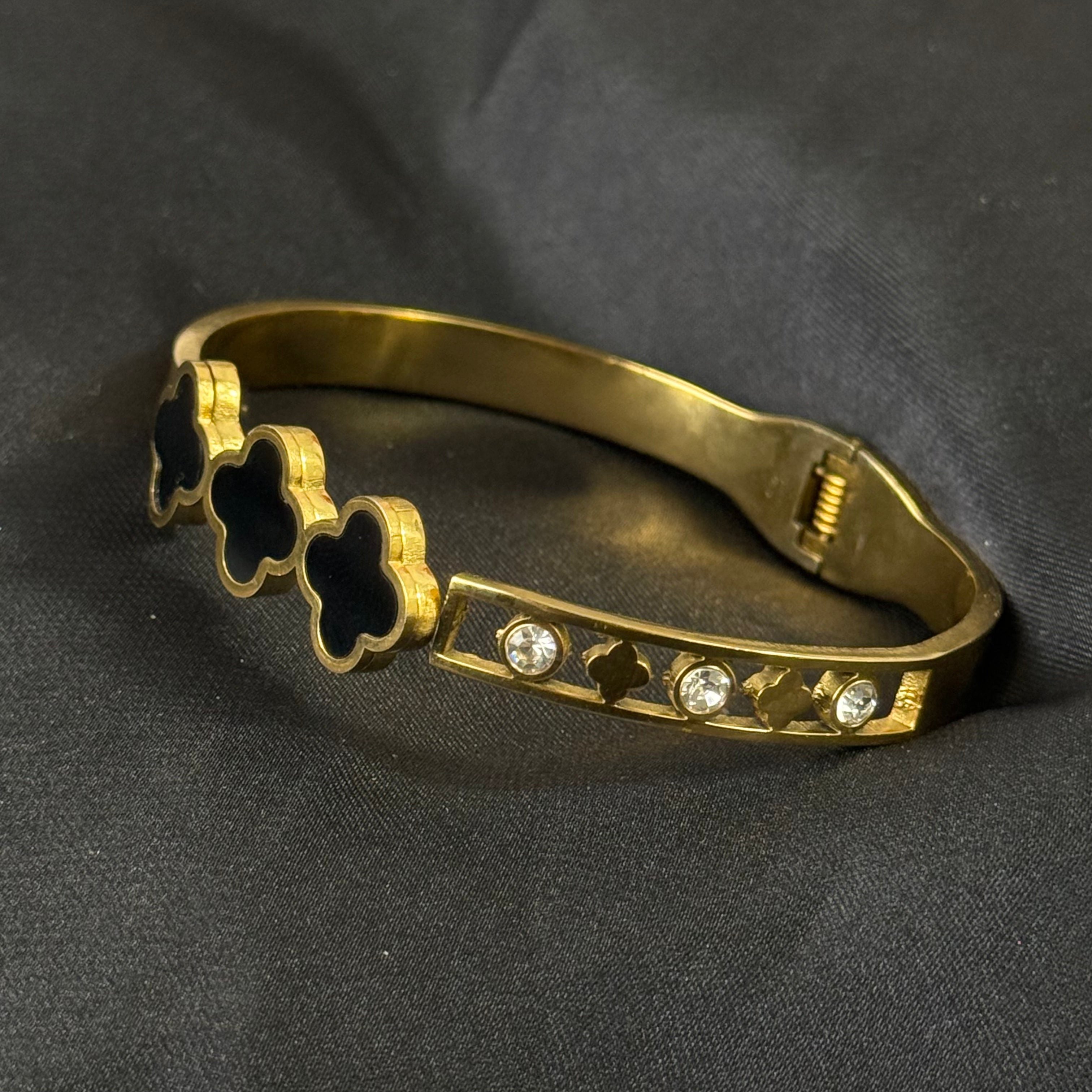 Golden Four-Leaf Clover Bangle Bracelet